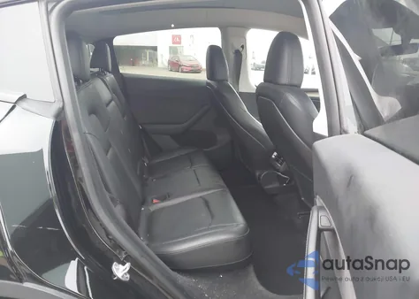 2023 Tesla Model Y Awd/Long Range Dual Motor All-Wheel Drive z USA, uszkodzony, nr VIN 7SAYGDEE8PA101552